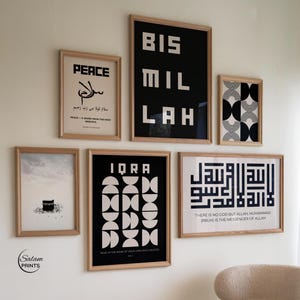 May include: A collection of framed art prints with Islamic calligraphy and geometric designs. The prints feature black and white text and patterns, with wooden frames. The artwork includes the words "Peace", "Iqra", and "Bismillah".