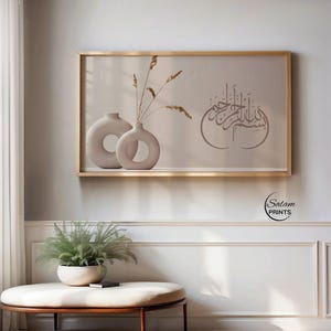 Samsung Frame TV art featuring Bismillah in  Arabic calligraphy on a beige neutral background. This Islamic digital wall art shows modern elegant flower vase with pampas grass . The soft earthy tones and organic textures complement contemporary home décor, making it perfect for living rooms, prayer spaces, or offices. Ideal for those seeking Islamic calligraphy, Muslim home décor, or elegant Quranic wall art with a boho aesthetic.