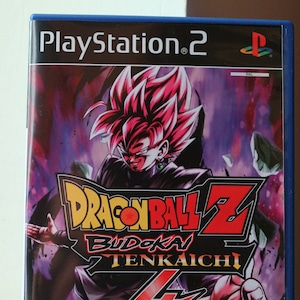 May include: PlayStation 2 game case with a purple, black, and red background. The game is Dragon Ball Z Budokai Tenkaichi 4. The cover features a character with red hair and a black outfit. The game is rated 12+ by the ESRB.