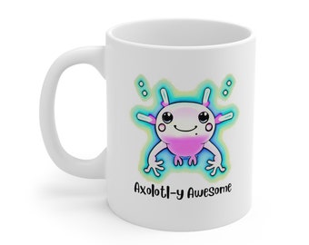 May include: White ceramic mug featuring a cartoon axolotl illustration. The axolotl is pink and blue with a light blue background. The text "Axolotl-y Awesome" is printed below the axolotl.