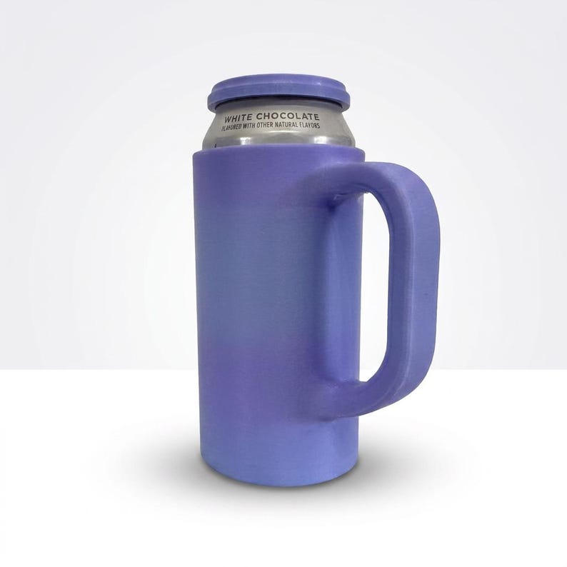 May include: A purple can cooler with a handle, holding a can of "White Chocolate" flavored beverage. The cooler has a cylindrical body and a curved handle. The can is silver with white text.