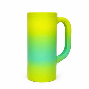 May include: A tall, cylindrical mug with a large handle. The mug features a gradient design, transitioning from yellow at the top to green in the middle and back to yellow at the bottom. The mug is made of a solid material and is suitable for beverages.