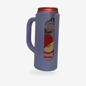 May include: A light purple can cooler with a handle, holding a can of Crisp Apple energy drink. The can features a red apple graphic and the words "ng energy". The cooler is designed to keep beverages cold.