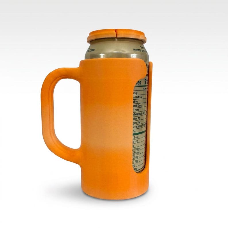 May include: An orange can cooler with a handle, designed to hold a standard-sized beverage can. The cooler is made of a solid, opaque material and features a cutout to view the can's label. The handle provides a comfortable grip for easy carrying.