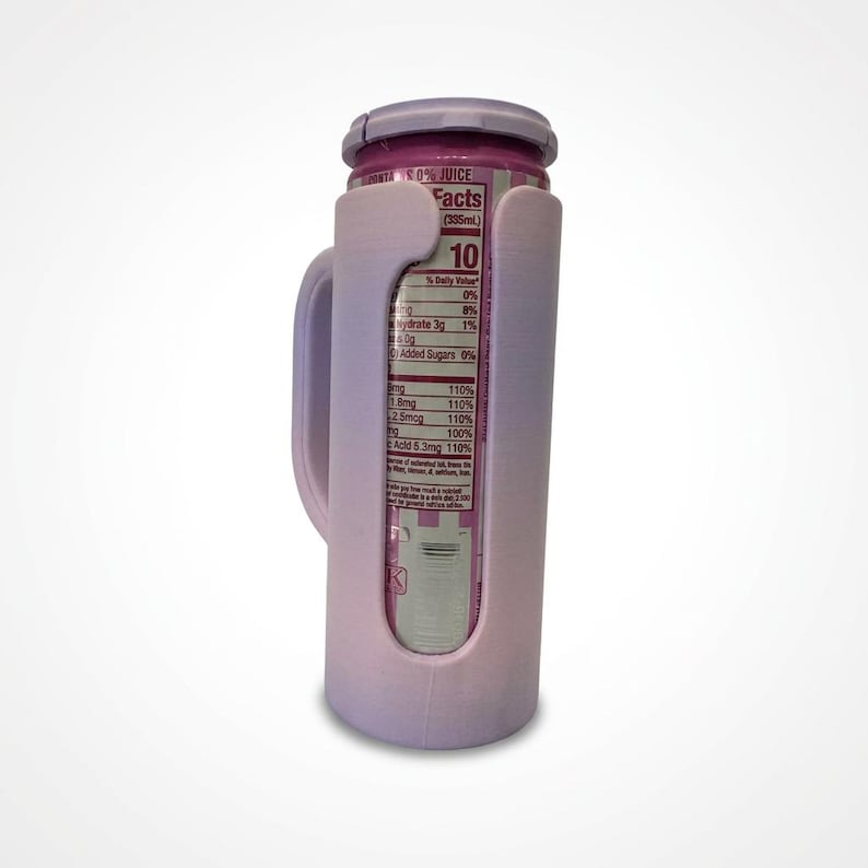 May include: A light purple can holder with a handle, holding a can of juice. The can is pink and has the word "Facts" printed on it. The can holder is made of plastic and has a smooth finish.