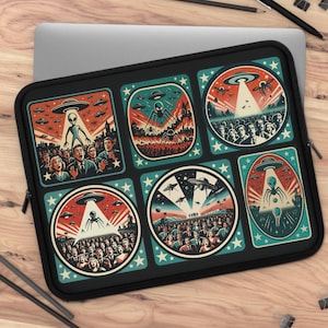 May include: Black laptop sleeve featuring a retro-style alien invasion design. The design includes various panels with illustrations of UFOs, aliens, and crowds of people. The color palette consists of red, blue, and beige.