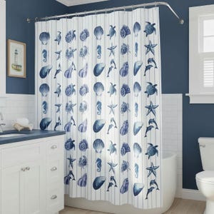 May include: A white shower curtain with vertical gray stripes and a repeating pattern of blue seashells, starfish, seahorses, turtles, and dolphins. The curtain is hanging in a bathroom with a white vanity and a blue wall.