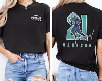 May include: A black t-shirt featuring a white front graphic that reads FOOTBALL mom with a football icon and a heart. The back graphic displays a football player in a teal uniform, the number 21, the name Michael, and the word RANGERS.