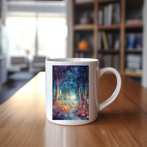 May include: White ceramic mug with a colorful watercolor illustration of a path leading through a forest with glowing lights and mushrooms. The mug has a handle on the right side.