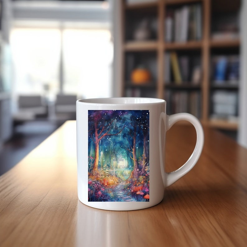 May include: White ceramic mug with a colorful watercolor illustration of a path leading through a forest with glowing lights and mushrooms. The mug has a handle on the right side.