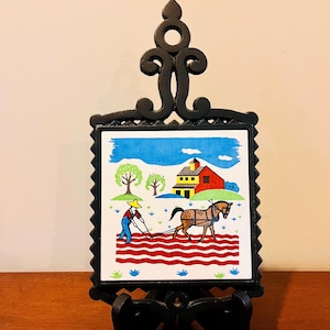 Vintage 1970’s Made in Japan Cast Iron Porcelain Tile Trivet. Farmer Tilling the Field With Horse and Farmhouse Trivet. Country Decor.