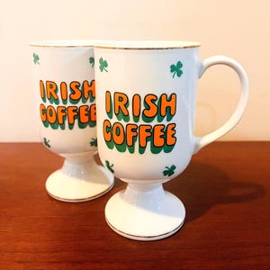 2 Vintage MCM Enesco Made in Japan Footed Porcelain Irish Coffee Blessing Mugs/Cups. St. Patrick Day Shamrock With Gold Trim Blessing Mugs.