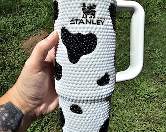 Beautiful Custom Bling White Rhinestone 40oz Stanley Tumbler w Black Rhinestone Cow Print & Black Logo