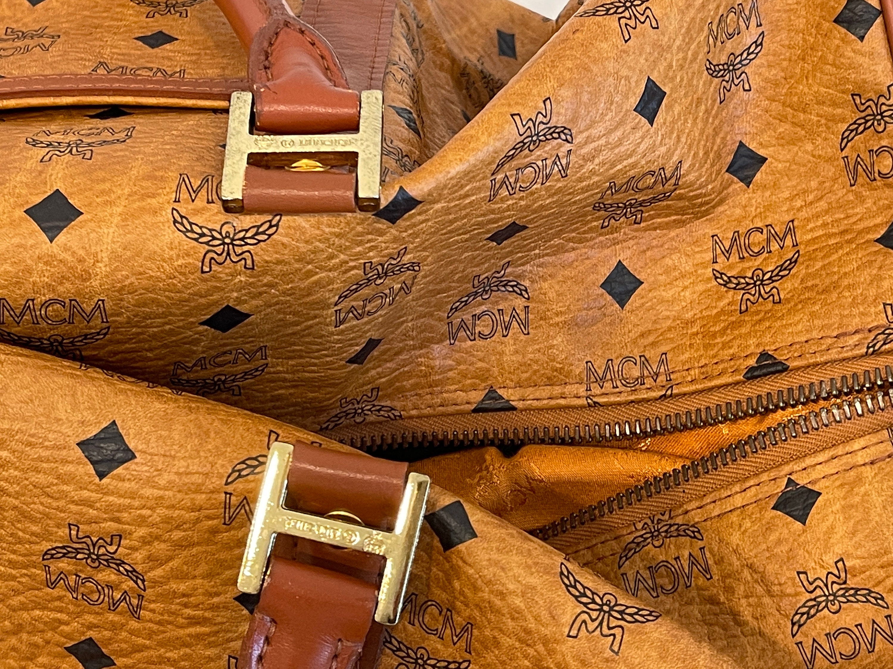 Sold at Auction: MCM MUNCHEN MONOGRAM LEATHER DUFFEL LARGE BAG