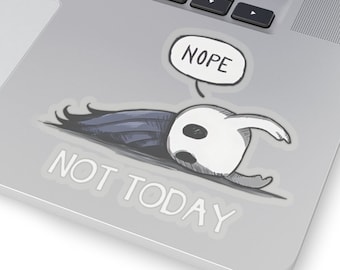 May include: A sticker featuring a cartoon character from the video game Hollow Knight. The character is lying on its back with its arms outstretched and a speech bubble above its head that says "NOPE". Below the character is the text "NOT TODAY".