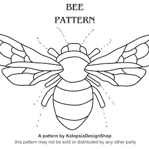 May include: A black and white line drawing of a bee with wings, a body, and six legs. The bee is in a simple, stylized design. The text "BEE PATTERN" is above the bee. The text "A pattern by KalopsiaDesignShop" is below the bee. The text "this pattern may not be sold or distributed by any other party" is below the text "A pattern by KalopsiaDesignShop".