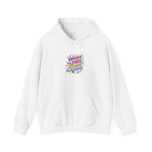 May include: White hoodie with a front pocket and drawstring hood. The front displays a colourful graphic that reads "SHORT LINES LOUD LAUGHS!" in a playful font with decorative elements. The hoodie is made of a soft material.