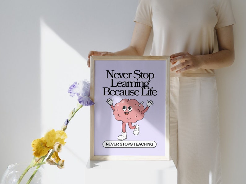 Vintage-inspired poster with the phrase 'Never Stop Learning Because Life Never Stops Teaching' featuring a whimsical font and playful illustrations of a brain.