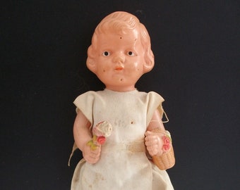 Rare Find! Vintage 1950's Celluloid Doll Japan Girl holding Flowers