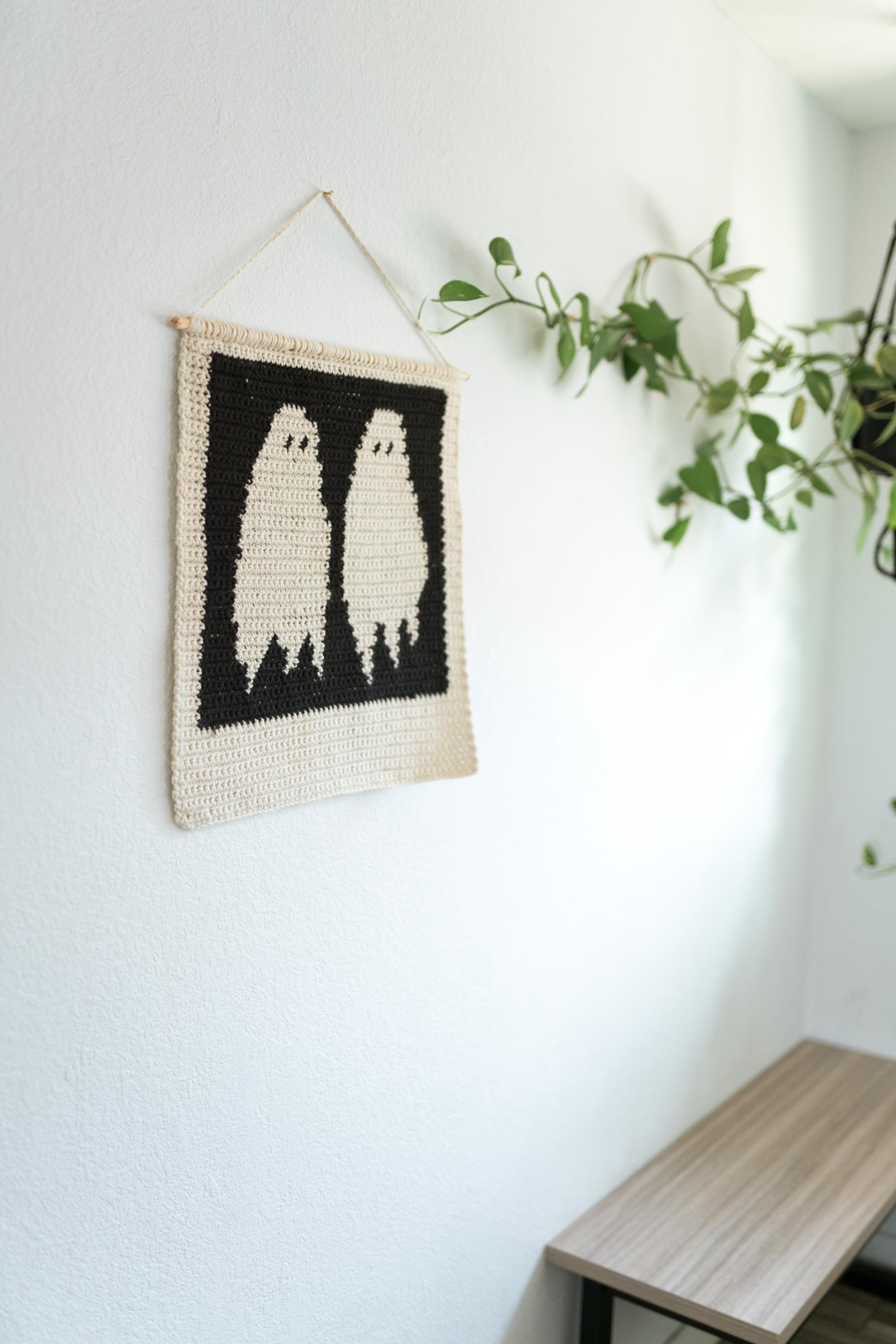 39 Ghost Crochet Patterns for Halloween: Spooky-Cute Amigurumi, Keychains, Bags, and Decor 31 Portrait of Ghosts tapestry crochet pattern / Wall