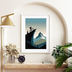 May include: A black and white illustration of a mountain biker riding on a cliff overlooking a mountain range. The mountain range is in the background and the sky is blue.