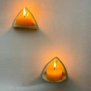 handmade small white and yellow ceramic miniature candle or crystal shelves
