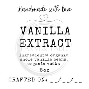 May include: A white label with black text that reads "Handmade with love" and a heart symbol. Below the text is a circle with the text "VANILLA EXTRACT" and the words "Ingredients: organic whole vanilla beans, organic vodka 8oz". Below the circle is the text "CRAFTED ON: __/__/___".