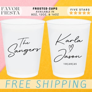 May include: Two white frosted cups with black text. The first cup says "The Sangers". The second cup says "Karla Jason 10|20|25".