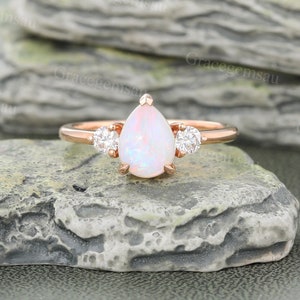 Pear shaped Opal engagement ring Unique Rose gold Teardrop Opal ring Moissanite Three stone ring Round cut Diamond ring Bridal Promise ring