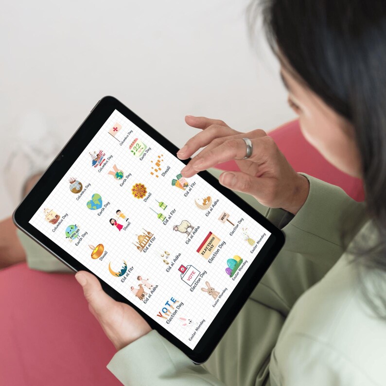 May include: A digital tablet displaying a calendar of holidays and events, including Earth Day, Diwali, Eid al-Fitr, Eid al-Adha, Election Day, and Easter Monday.