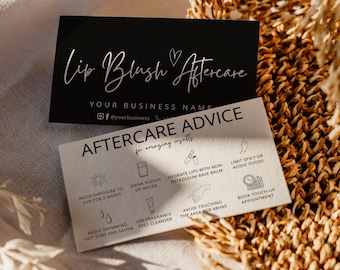 May include: Two business cards with aftercare advice for lip blush treatments. The top card is black with silver text reading "Lip Blush Aftercare" and business details. The bottom card is white with aftercare instructions and icons.