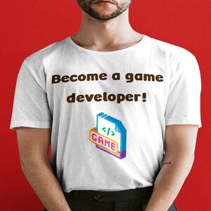 May include: A white t-shirt with the text "Become a game developer!" and a stylised image of a file labelled "GAME" with code symbols.
