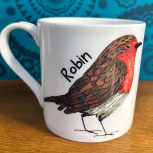 Robin, Fine Bone China Mug, beautifully, hand decorated with an original illustration by Rachel Smith, part of the Garden Bird Range