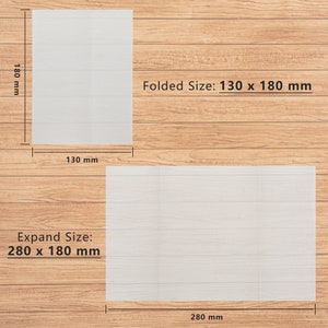 May include: A white paper sheet folded in half, showing the dimensions of the paper when folded and unfolded. The folded size is 130 mm x 180 mm, and the expanded size is 280 mm x 180 mm.
