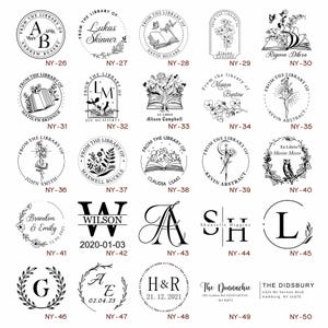 May include: A set of 50 black and white custom rubber stamps featuring various designs, including initials, names, and quotes. The stamps are arranged in a grid pattern on a white background.