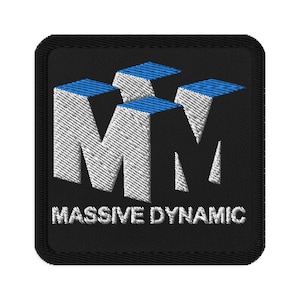 May include: A black embroidered patch with a white 3D "MM" logo and the text "MASSIVE DYNAMIC" in white.