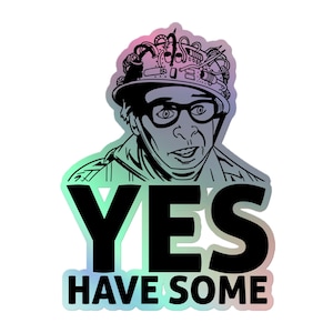 May include: A holographic sticker featuring a black and white line art illustration of a person wearing a helmet with wires and glasses. Below the illustration, the text YES HAVE SOME is printed in bold black capital letters on the sticker.