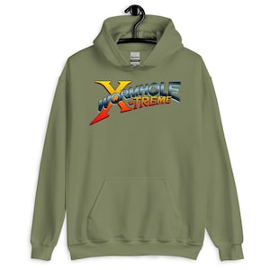 May include: An olive green hooded sweatshirt with the text "WORMHOLE XTREME" in a colorful, stylized font. The design features yellow, orange, blue, and red accents. The sweatshirt has a front pocket and a drawstring hood.