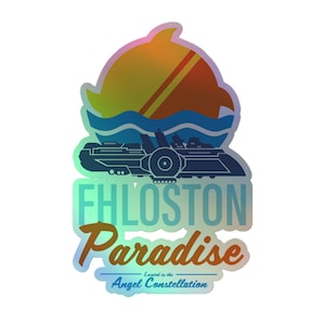 May include: A holographic sticker featuring a stylised orange sun, blue waves, and a dark blue spaceship. The text reads Fhloston Paradise in large letters, with the smaller text Located in the Angel Constellation underneath the main design.