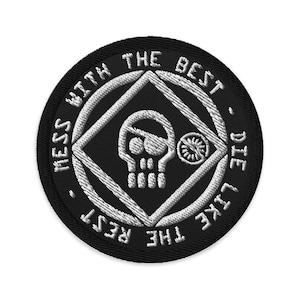 May include: Black and white embroidered patch with a skull and crossbones design. The text around the design reads "Mess with the best - Die like the rest".