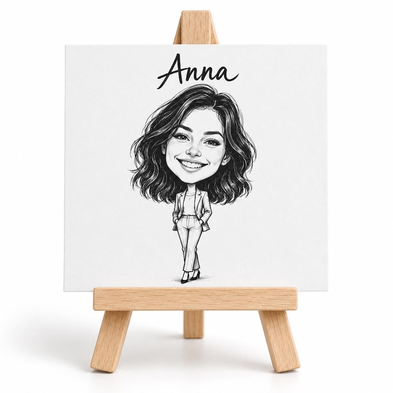 May include: A black and white caricature illustration of a person with shoulder-length wavy hair, wearing a blazer and trousers, standing with hands in pockets. The name Anna is written in black script above the figure on a white canvas on an easel.
