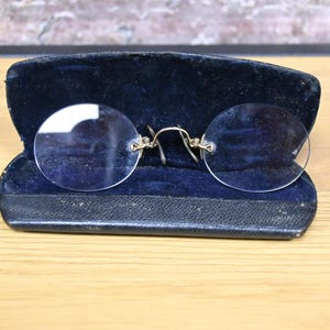 Antique Pince Nez Glasses, Vintage Rimless Oval Spectacles, 1910S Era Pinch Nose Design Eyeglasses, Classic Clip Bridge Elliptical Lens