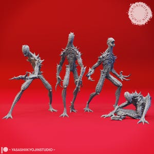 May include: Four grey, spiky humanoid figures are displayed against a red background. The figures have elongated limbs and bodies covered in sharp protrusions. One figure is kneeling, while the others stand in various poses. The text "YASASHIIKYOJINSTUDIO" is at the bottom.