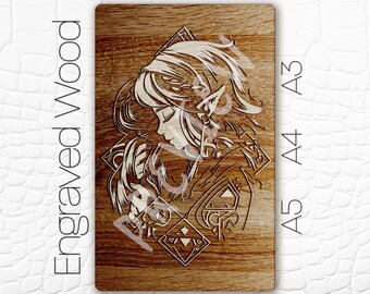 May include: Engraved wood art piece featuring a detailed portrait of a character with long hair and pointed ears. The artwork is in a layered design with a light wood color against a darker wood grain background. The text "Engraved Wood" is vertically aligned on the left.