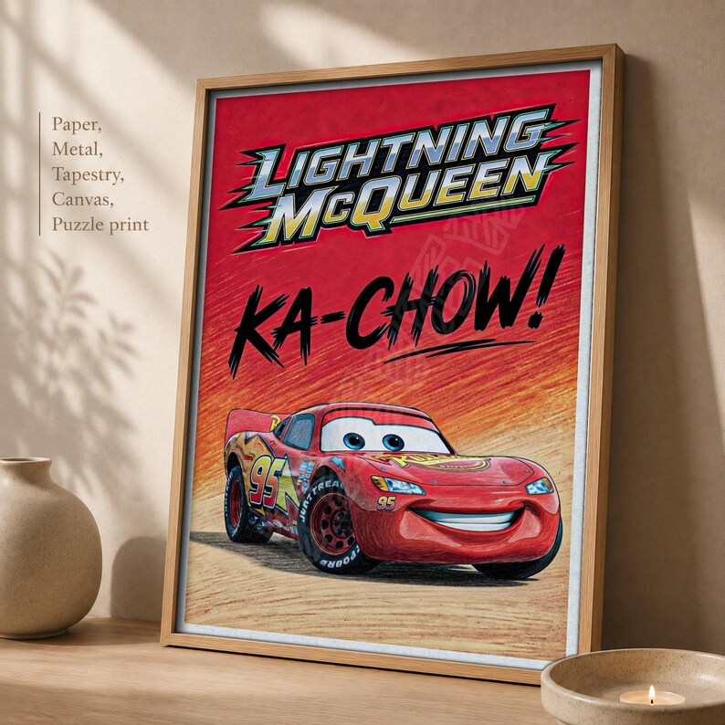 May include: A framed rectangular print featuring the red race car Lightning McQueen with the number 95 on the side. The text LIGHTNING MCQUEEN appears in bold letters above the word KA-CHOW! set against a textured orange and yellow background.