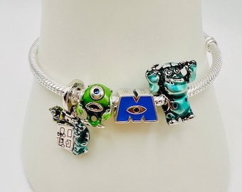 Pandora Disney 100th Anniversary Bracelet and Monster University Complete Set.