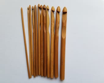 May include: A set of 10 bamboo crochet hooks in various sizes, ranging from 2.5mm to 10.0mm. The hooks are made of natural bamboo and have a smooth, polished finish.