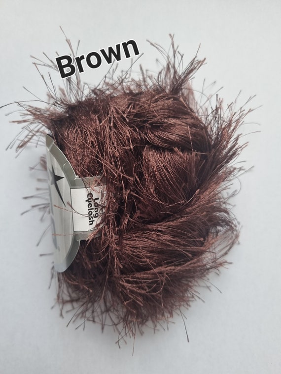 thumbnail interactive-video image 1 of Ice 38yd Dark Red Extra Long Eyelash Yarn - 50g, Bulky Weight, Polyester, #42079 1 of 5
