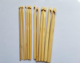May include: A set of 10 bamboo crochet hooks in various sizes, ranging from 3.5 mm to 7.0 mm. The hooks are made of natural bamboo and have a smooth, polished finish.