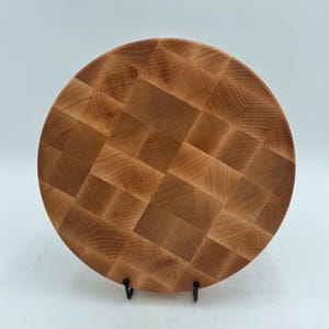 Tabla de cortar redonda de madera de veta final - Arce o nogal negro